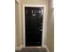 Unit 701's black entryway door with secure lock at 444 17Th St # 701, Denver, CO 80202