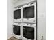 Convenient in-unit laundry featuring stacked, modern washer and dryer units at 444 17Th St # 701, Denver, CO 80202