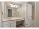 Clean bathroom with vanity, sink, and shower/tub combo at 7877 E Mississippi Ave # 202, Denver, CO 80247