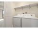 Laundry room with washer and dryer included at 7877 E Mississippi Ave # 202, Denver, CO 80247