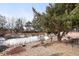 Peaceful pond with a bench, perfect for relaxation at 7877 E Mississippi Ave # 202, Denver, CO 80247