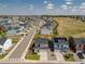 Suburban aerial view showcasing the residence, street, and neighborhood amenities at 1135 Basalt Ridge Loop, Castle Rock, CO 80108