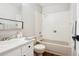 Clean bathroom featuring a tub-shower, white vanity, and neutral color scheme at 1120 Bacchus Dr # B16, Lafayette, CO 80026