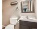 Cozy bathroom with a modern vanity and a sleek mirror at 8795 W Cornell Ave # 1, Lakewood, CO 80227