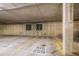 Well-lit parking garage with reserved parking spots, providing convenience and security for residents at 4875 S Monaco St # 105, Denver, CO 80237