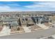Aerial view of a suburban neighborhood featuring a mix of single-Gathering homes at 8099 Arapahoe Peak St, Littleton, CO 80125