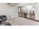 Unfinished basement craft room with custom workbench and storage cabinets at 8099 Arapahoe Peak St, Littleton, CO 80125