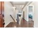 Elegant entryway with hardwood floors and tray ceiling detail at 8099 Arapahoe Peak St, Littleton, CO 80125