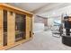 Basement gym with a sauna, bike, and punching bag at 8099 Arapahoe Peak St, Littleton, CO 80125