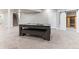 Finished basement game room with a pool table and sliding barn door at 8099 Arapahoe Peak St, Littleton, CO 80125