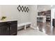 Mudroom area with built in bench and storage space at 8099 Arapahoe Peak St, Littleton, CO 80125
