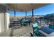 Community patio offering tables and views of open space at 8099 Arapahoe Peak St, Littleton, CO 80125
