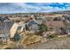 Aerial view of a neighborhood with well-maintained lawns, and a fenced yard, perfect for Gathering living at 10551 Redcone Way, Highlands Ranch, CO 80130