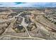 Drone view of a well-planned residential neighborhood with winding streets and picturesque walking paths at 10551 Redcone Way, Highlands Ranch, CO 80130