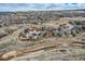 Neighborhood aerial displaying the community layout with walking path and various home styles at 10551 Redcone Way, Highlands Ranch, CO 80130