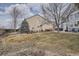 Spacious backyard with a wooden fence and plenty of room for recreation and relaxation at 10551 Redcone Way, Highlands Ranch, CO 80130