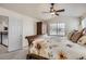 Bright bedroom with carpet, large bed and natural light from window and door at 10551 Redcone Way, Highlands Ranch, CO 80130