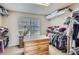 Spacious walk-in closet featuring a central dresser and ample hanging storage, perfect for organizing your wardrobe at 10551 Redcone Way, Highlands Ranch, CO 80130