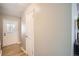 Bright entryway featuring wood-look tile flooring and a stylish front door at 2650 Perry St, Denver, CO 80212