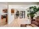 View of the living room and kitchen areas with open space and stylish flooring at 2650 Perry St, Denver, CO 80212