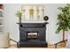 Black brick fireplace with a traditional mantel at 2521 Champa St, Denver, CO 80205