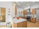 Modern kitchen with light wood cabinets, quartz countertops, and stainless steel appliances at 2521 Champa St, Denver, CO 80205