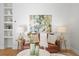 Cozy living room with a leather sofa and built-in shelving at 2521 Champa St, Denver, CO 80205