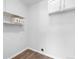 Bright laundry room with shelving and hookups at 12662 E Warren Dr # F, Aurora, CO 80014