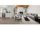 Bright living room featuring a stone fireplace and an open concept floorplan at 12662 E Warren Dr # F, Aurora, CO 80014