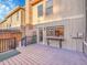 Outdoor deck area with a barbecue space, perfect for entertaining guests in a backyard at 8166 E Phillips Ave, Centennial, CO 80112