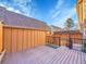 Backyard deck offers a serene spot with surrounding fencing for enhanced privacy and relaxation at 8166 E Phillips Ave, Centennial, CO 80112