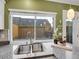 Kitchen sink with view of the back yard and outdoor deck at 8166 E Phillips Ave, Centennial, CO 80112