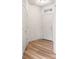 Bright entryway with wood-look flooring and white walls at 1849 S Helena St, Aurora, CO 80017