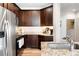 Kitchen with stainless steel appliances and granite countertops at 1849 S Helena St, Aurora, CO 80017