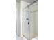 Shower featuring subway tiles and glass enclosure at 1849 S Helena St, Aurora, CO 80017