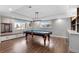 Finished basement with pool table, bar, and recessed lighting at 7181 Longview Dr, Niwot, CO 80503