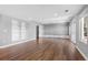 Finished basement with built-in shelving and hardwood floors at 7181 Longview Dr, Niwot, CO 80503