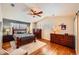 Spacious bedroom with hardwood floors, natural light, and ample closet space at 6892 Turnstone Ave, Castle Rock, CO 80104