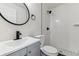 Updated bathroom featuring subway tile shower and modern black fixtures at 1032 Geneva, Aurora, CO 80010