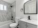 Updated bathroom featuring subway and marble tile shower and modern black fixtures at 1032 Geneva, Aurora, CO 80010