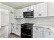 Contemporary kitchen with new cabinets, counter tops and stainless steel appliances at 1032 Geneva, Aurora, CO 80010