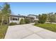 Lovely home with a large driveway, well-manicured lawn, and charming curb appeal at 13661 W Tufts Ave, Morrison, CO 80465