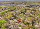 Aerial view of home in a lush, tree-filled neighborhood with mature landscaping and easy access to city amenities at 6314 Brooks Dr, Arvada, CO 80004