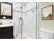 Bathroom with glass shower and vanity at 6314 Brooks Dr, Arvada, CO 80004