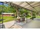 Backyard featuring covered patio with dining set, perfect for outdoor entertaining at 6314 Brooks Dr, Arvada, CO 80004