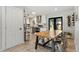 Modern open kitchen with stainless steel appliances and breakfast table at 6314 Brooks Dr, Arvada, CO 80004