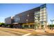 Exterior of a modern public library building with glass windows and architectural details at 6314 Brooks Dr, Arvada, CO 80004