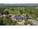 Expansive property with a large home, horse barn, and plenty of green space and riding trails at 13962 W 76Th Ln, Arvada, CO 80005
