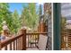 Relaxing balcony with wooded views and comfortable seating; perfect for enjoying the outdoors at 434 Kings Crown Rd, Breckenridge, CO 80424