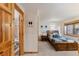 Bedroom with views of bathroom, bedroom, and natural light at 434 Kings Crown Rd, Breckenridge, CO 80424